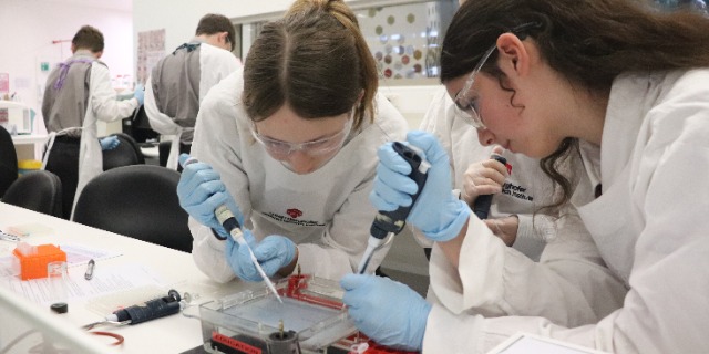 Two students in science lab