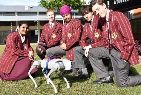 Five students with robot dog.
